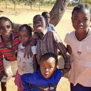 Children pulling faces at the camera in Zambia