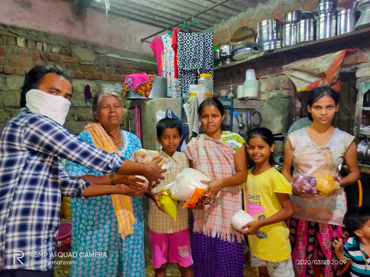 A family in Patripul receiving food