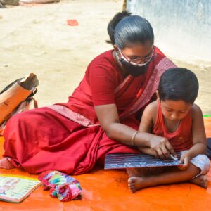 Teacher and child at Bangladesh preschool
