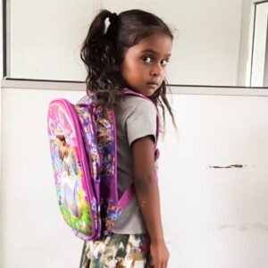 Sri Lankan child with school pack